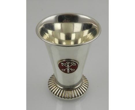 A Russian silver vodka cup, having applied enamel decoration, bearing makers mark for Br Grachev.