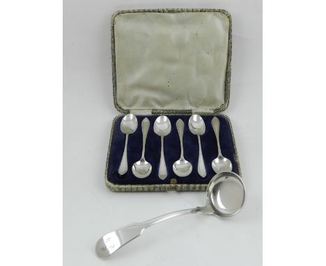 A silver fiddle back ladle, Edinburgh 1858, bearing ownership initials, together with a boxed set of six bright-cut teaspoons