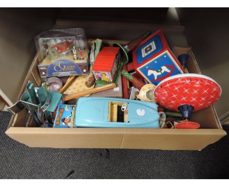 A box of 1970's and later toys including tin plate cars, spinning tops etc