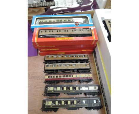 Sventeen Hornby, Lima and Airfix 00 gauge carriages including Chloria, Sleeping etc some boxed
