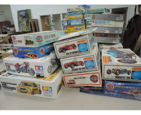 Nine Airfix, Matchbox an tamiya mixed scale plastic kits, motor vehicles including Bugatti Type 59, AMG Mercedes, Moto Guzzi 