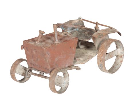 A VINTAGE PAINTED METAL MODEL TRACTOR early 20th century, 17cm high x 30cm longProvenance: The Richard Pratley Collection of 