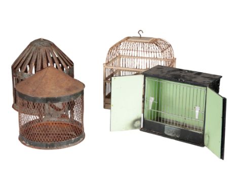 A GROUP OF FOUR VINTAGE BIRD CAGES including a white-painted architectural example, 34cm high, two domed and slatted-metal ex