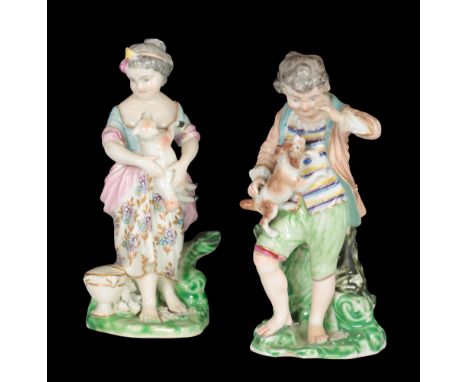 A PAIR OF 18TH CENTURY DUESBURY &amp; CO DERBY PORCELAIN FIGURES - CHILDREN WITH ANIMALS the boy modelled with puppy, the gir