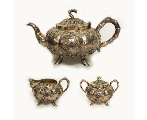 Late C19th Chinese Silver Tea Service by Wang Hing with Chinese touchmarks, relief decoration, bamboo style handles & support