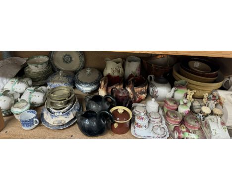 A floral decorated part tea service together with blue and white pottery tureens and covers, swan jardinieres, part dressing 