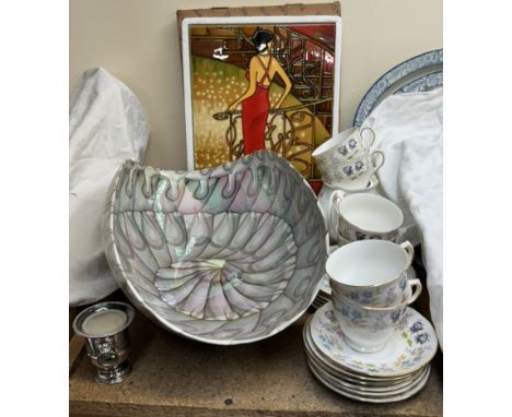 A Fiesta Studios pottery panel depicting a lady descending the stairs together with a curved opalescent bowl and a Queen Anne