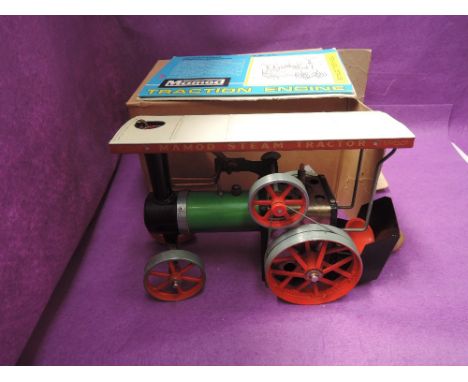 A Mamod Steam Tractor, with instructions and plain card box