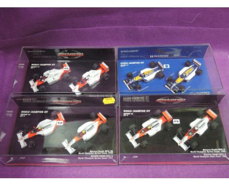 Four Minichamps 1:43 scale World Champions limited edition sets, Mclaren 85/86, 88/89, 90/91 and Williams 92/93, all in plast