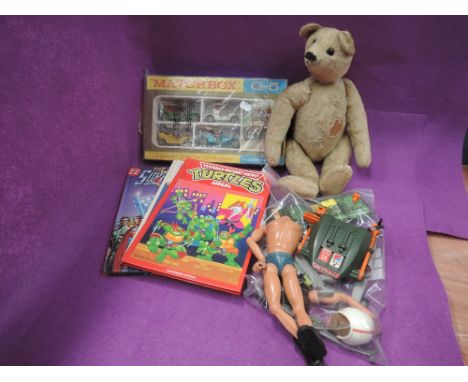 A CPG Products Action Man and accessories including Turbo-Copter and Field phone etc, an early 20th century straw filled tedd