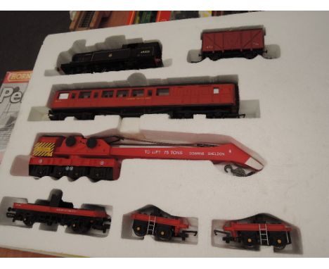 A Hornby 00 gauge part train set, Permanent Way containing 0-6-2 tank locomotive and rolling stock, missing track and control