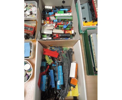 Two boxes of ERTL and Hornby 00 gauge Thomas The Tank Engine locomotives, rolling stock and track