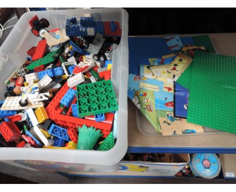 A box of vintage Lego including instruction booklets 6877, 8815 etc