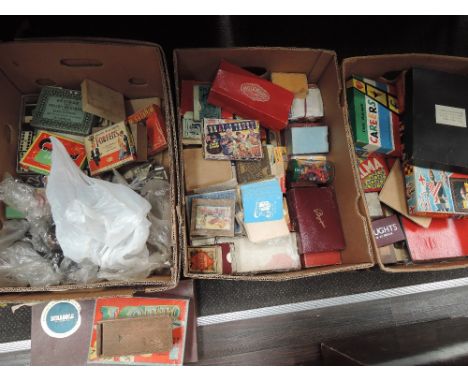 Three boxes of vintage card and board games including Monopoly, Scrabble, Millionaire, Bezique, Forfeits, Contraband etc