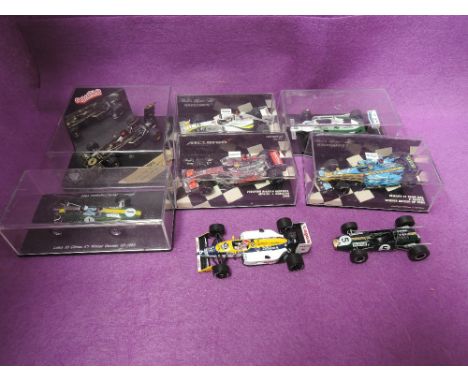 Eight Minichamp and similar 1:48 scale diecast motor racing cars, Renault F1 team R26 2006, Williams Ford FW07B 1980, Lotus 3