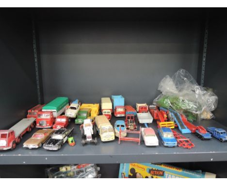 A shelf of mixed diecasts including Dinky, Corgi, Britains etc including, Eight Wheeled flat bed, David Brown tractor etc