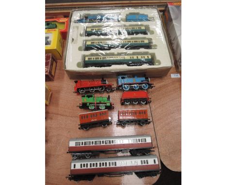 A selection of Hornby 00 gauge the world of Thomas the Tank Engine including Gordon loco and tender with three carriages in p