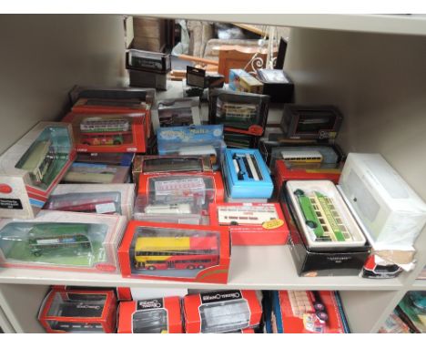 A Shelf of 30 modern EFE and similar diecast model buses and fire fighting vehicles, all boxed