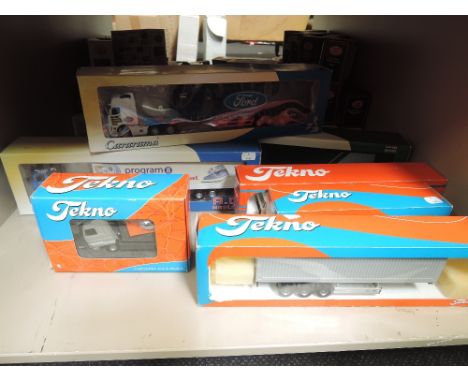 A shelf of Tekno and Cararama diecast  part articulated boxed set