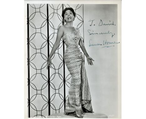 Lena Horne, vintage signed and dedicated 10x8 black and white photograph. Horne was an African-American dancer, actress, Gram