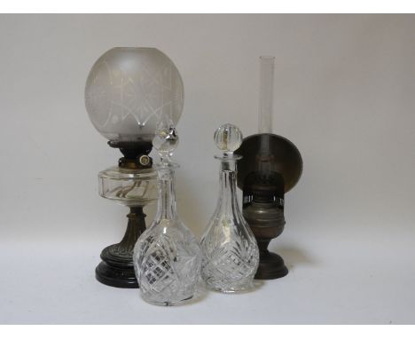 A pair of French neo classical metal tow branch wall lights, a gilt metal wall light of pagoda form, a pair of decanters, two