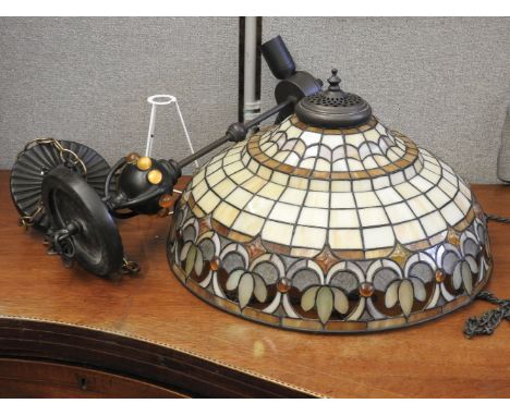 A Tiffany design ceiling light, with a stained glass shade