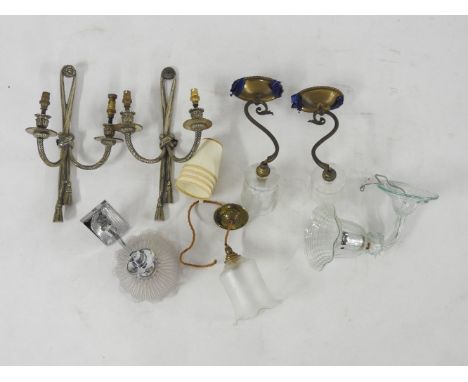 A pair of silvered rope twist wall lights, together with an art deco chrome and glass wall light and three further wall light