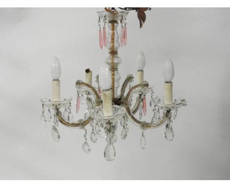 A fire light glass hanging electrolier with scrolling arms, 47cm tall