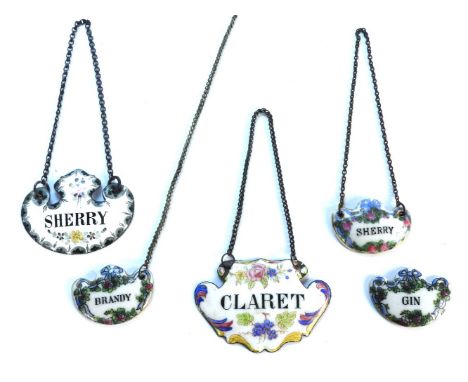 Two 19th century enamelled decanter labels, together with three pottery labels