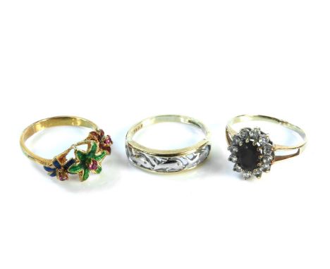 A 9ct gold dyed green quartz and white stone ring, a gold enamel floral ring, tested as approximately 18ct, a 9ct white and g