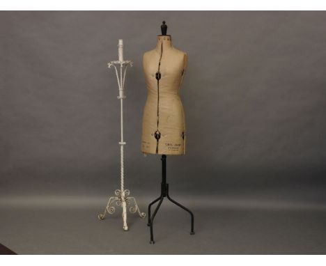 A Chil-daw pioneer dressmakers dummy on wrought iron base and a wrought iron lamp standard (2)