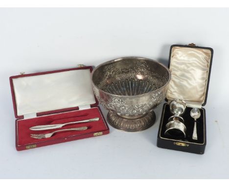 A small silver pedestal bowl, with repousse fruiting swag decoration, marks for Birmingham Alexander Clark together with a si