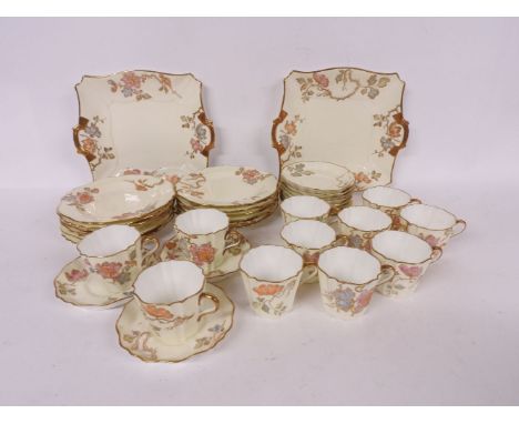 A Victorian Wedgwood flower decorated part coffee service with gilt highlights, to include eleven cups, saucers, side plates 