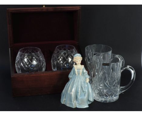 A boxed pair of Cartier cut glass brandy glasses, two Webb tankards and a Royal Worcester 'Grandmother's dress' figurine