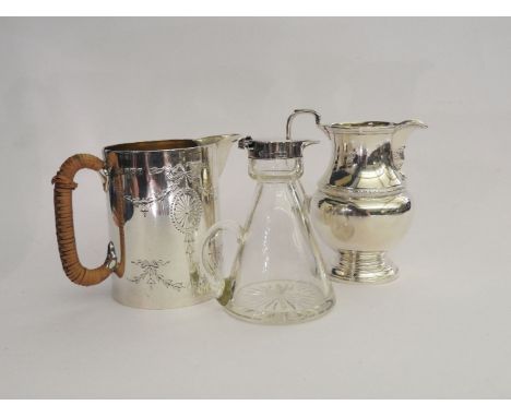 A hallmarked silver cream jug,  one other and a silver topped tot decanter