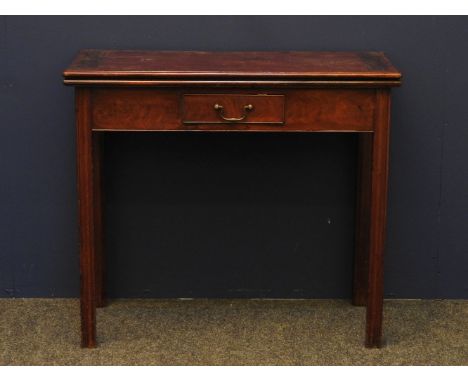 A George III mahogany card table, with channelled and chamfered legs