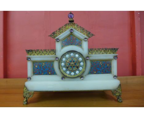 A 19th Century French 8-day exhibition quality white onyx and gilt metal table clock, in the form of a pavilion with turquois