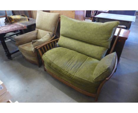 An Ercol elm two seater settee, armchair and coffee table 