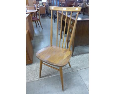 An Ercol Blonde elm and beech 608 model chair 