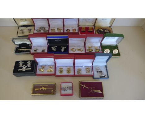 Seventeen pairs of gilt metal cufflinks, including one silver pair also some tie pins, in good condition 