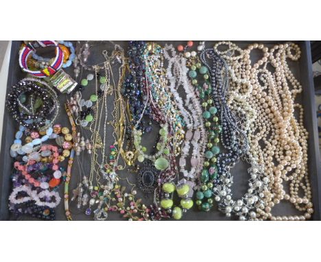 A large quantity of vintage and later costume jewellery including rose Quartz, amethyst, cloisonne beads, good quality imitat