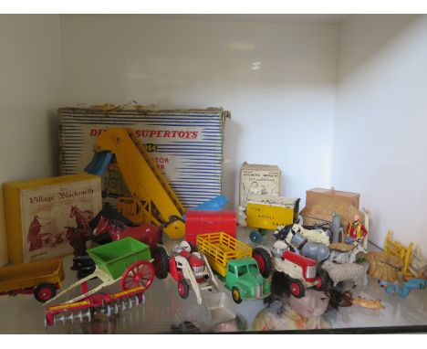A boxed Dinky Supertoys die-cast model Elevator Loader - 964, together with other die-cast vehicles and figures, some Dinky, 