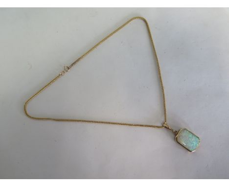 An opal pendant and necklace, both 9ct yellow gold, total weight approx 9 grams, minor break to chain, otherwise good 