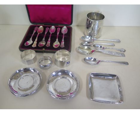 A collection of silver approx 12 troy oz, including a small tankard, cased set of teaspoons and two Chinese coin dishes, over