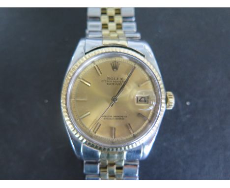 A gents Rolex bi-metal Oyster perpetual datejust, wristwatch, 37mm wide including button, in running order, slight stretching