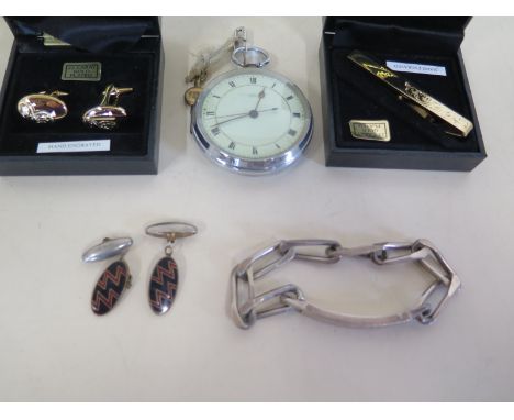 A silver bracelet together with two pairs of cufflinks, a Thomas Russell and son steel cased key wind pocket watch, and a tie