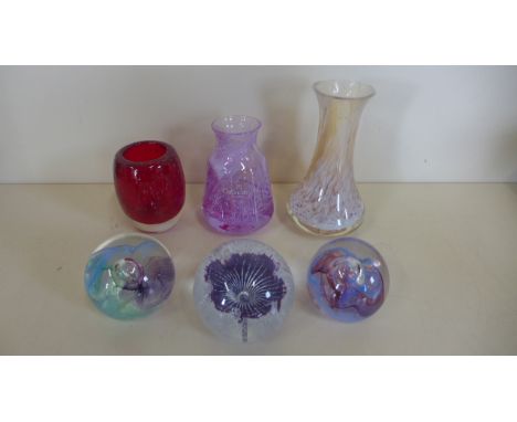 Four pieces of Caithness glass ware, three paperweights and one vase, together with two other small vases, most in good condi