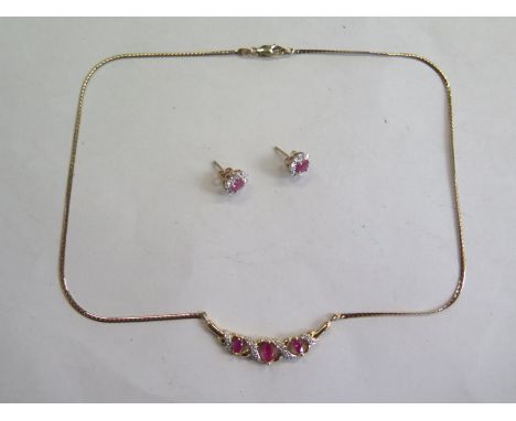 A 9ct gold ruby and diamond necklace and earring set, necklace approx 42cm long, overall weight approx 8.1 grams 