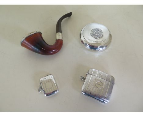 Two silver Vestas and a silver rimmed pipe, Vestas in generally good condition, some wear to pipe, Vestas weight approx 1.7 t