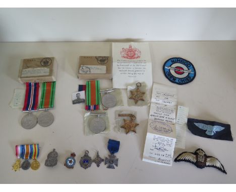 A collections of WWII medals for two brothers, Cpl H Squires Africa Star with clasp, 1939-45 star, Defence and War medals wit